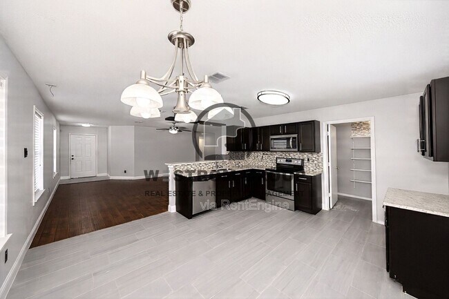 Building Photo - 8732 Polo Dr