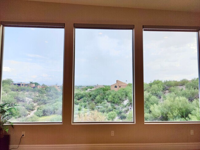 Building Photo - Mountain and City Views from this Furnishe...