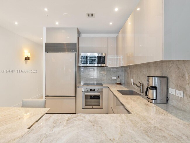 Building Photo - 6799 Collins Ave