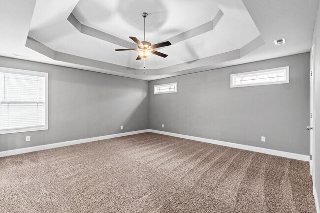 Building Photo - Pet Friendly Three Bedroom with Bonus!