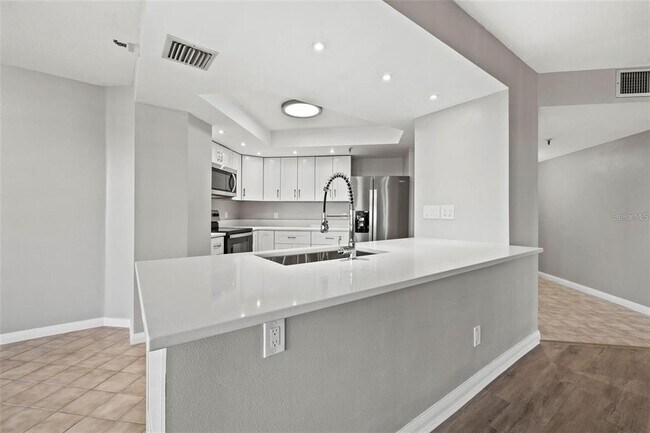 Building Photo - 5950 Pelican Bay Plaza S