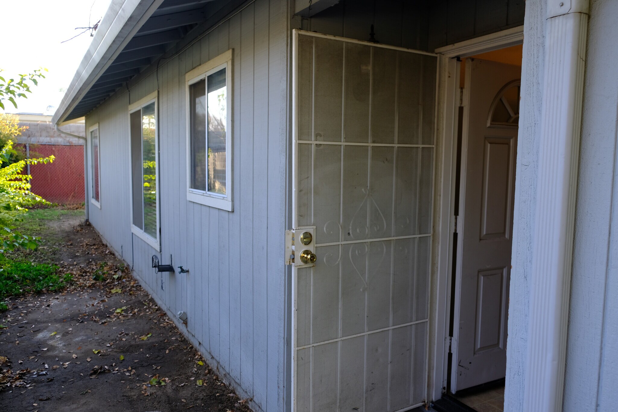 Front entrance with Kitchen, Dining & 1st Bedroom windows - 118 W Beverly Pl