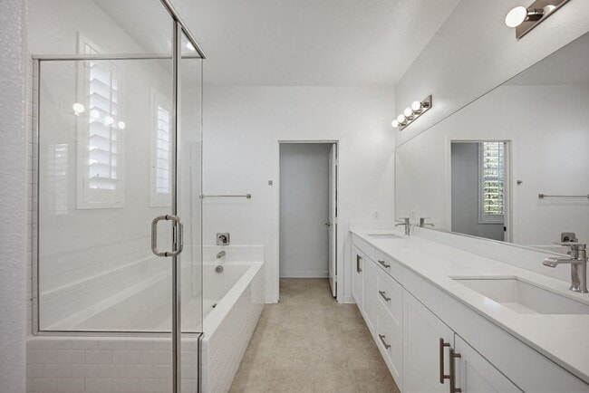 Building Photo - NEW LISTING 4 Bedroom, 3 Bathroom, 2 Garage Detached Condominium, with HVAC, Tankless Water Heate...