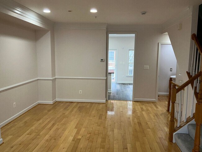 Building Photo - Beautiful 4BR 4.5BA 4 level townhome with 2 car attached garage located in the Fallsgrove Community