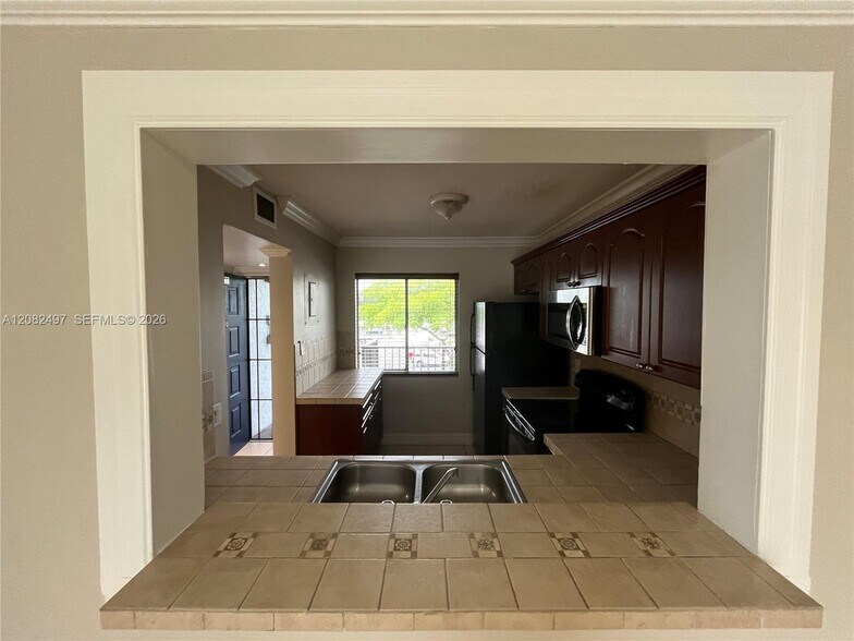 Building Photo - 8560 N Sherman Cir