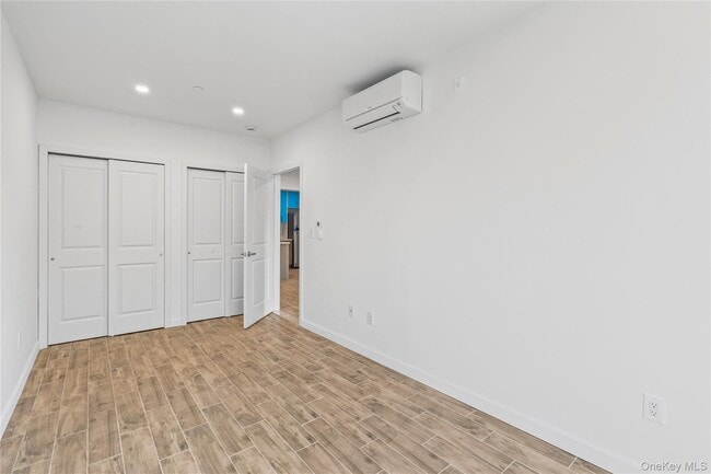 Building Photo - 213-41 38th Ave