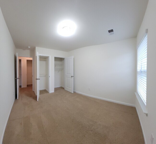 Building Photo - Modern 3-Bedroom Multiplex with 3 Full Bat...