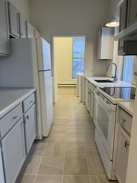 New ceramic flooring, appliances, granite tops and lighting - 118 Philip St