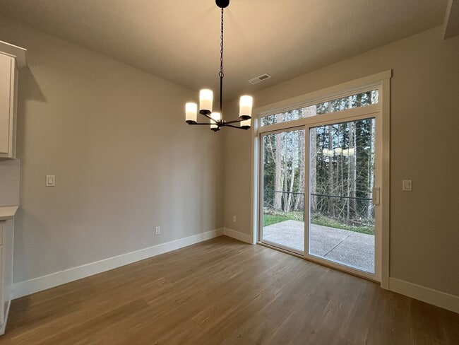 Building Photo - Modern 2025-Built 4 Bedroom Home with EV Charging, 5kW Solar, Open-Concept Living, Scenic Outdoor...