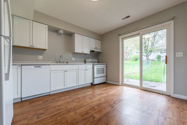 Building Photo - **Charming 3-Bedroom Home with Spacious Ya...