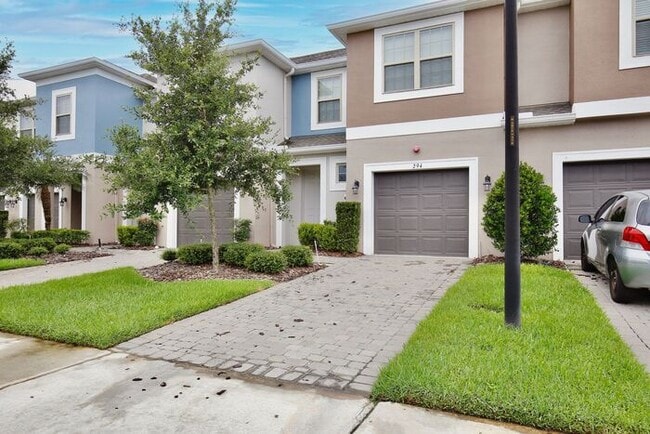 Building Photo - Gorgeous 3/2.5 Modern Townhome with 1 Car ...