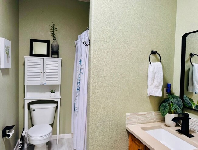 Building Photo - 3-Bedroom Home with Garden Oasis & Covered Patio – Bethel Neighborhood