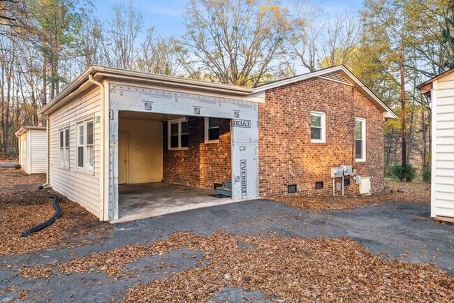 Building Photo - McLeansville - Minutes from Elon & Greensboro! Few Acres, Brick Duplex, Just Painted, New Carpet,...