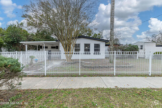 Building Photo - 7028 Delisle Dr