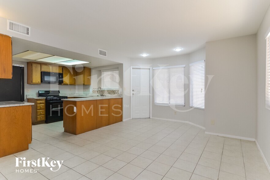 Building Photo - 7034 Rusty Nail Way