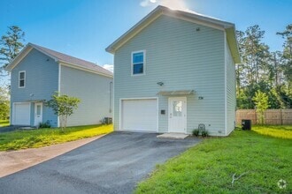 Building Photo - Modern Comfort Meets Prime Location — Styl...