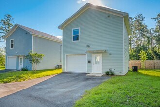 Building Photo - Modern Comfort Meets Prime Location — Styl...