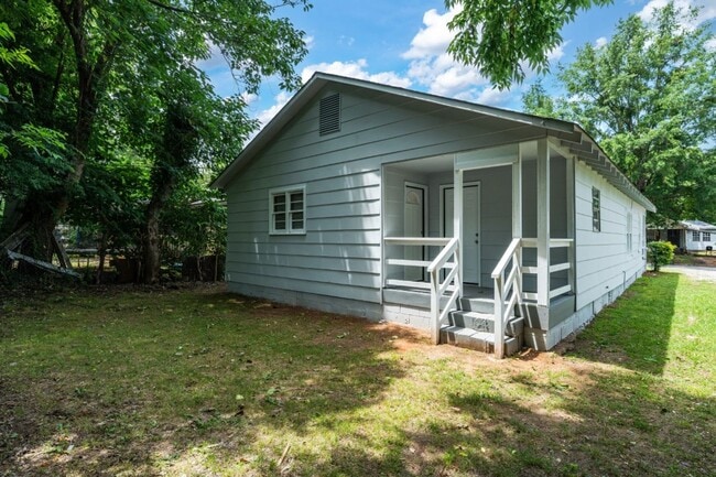 Building Photo - Stylish 4BR/2BA Home in Tuscaloosa – Moder...