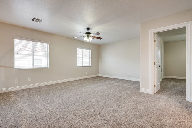 Building Photo - Spacious 3-Bedroom Home Featuring Downstai...