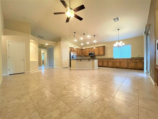 Building Photo - Vaulted Ceiling single-story home in a gat...