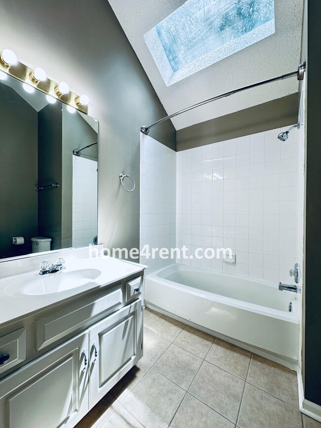 Building Photo - Blue Valley Schools w/ Wood Floors, Finished Basement and a Peaceful, Private Fenced Yard!