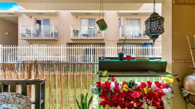 Building Photo - 7935 W 30th Ct