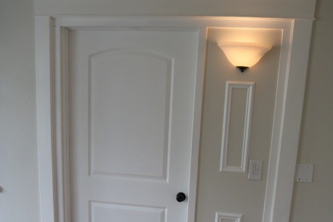 arch doors, old woodwork, sconces on dimmers - 470 South Ave