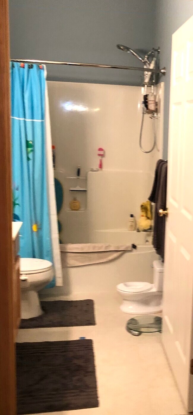 Bathroom has been painted beige to match living room - 20534 Cypress Dr