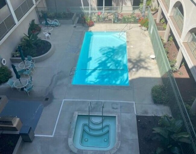Building Photo - Step into luxury living with this exquisite 2 bedroom 2 bath 3rd floor condo at Emerald Villas