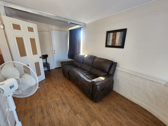Building Photo - Coming Soon! Furnished One Bedroom with Bo...
