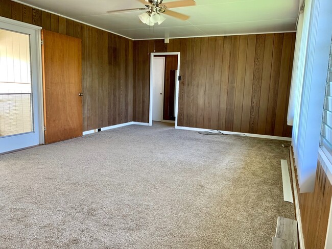 Building Photo - Charming Singe Family Home 3/1/2 with Spacious & Fenced Yard