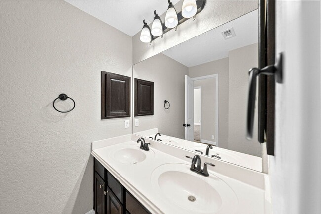 Building Photo - Corner Homesite. Gated Community. 4 Bedroom 1 Story with Formal Dining and Formal Office