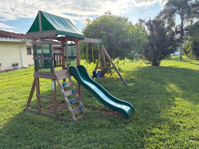Playground right behind the pool cage with fun for the little ones! - 2316 Everest Pky