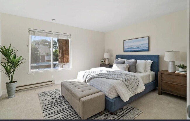 Building Photo - 1 bedroom plus loft features a functional floorplan with high ceilings