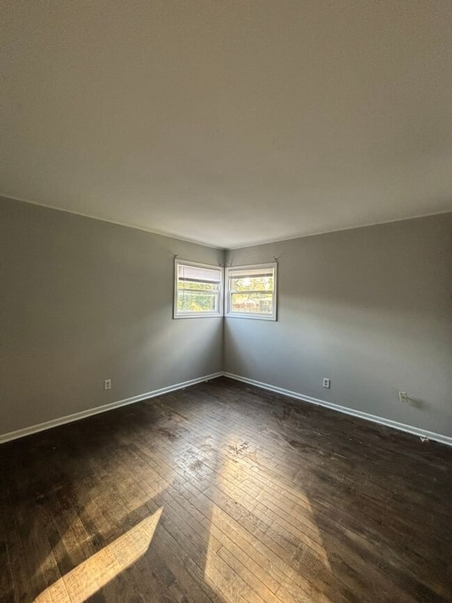 Building Photo - 3 BR 1.5 BA split-level with attached 1 ca...