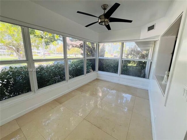 Building Photo - 10190 Collins Ave