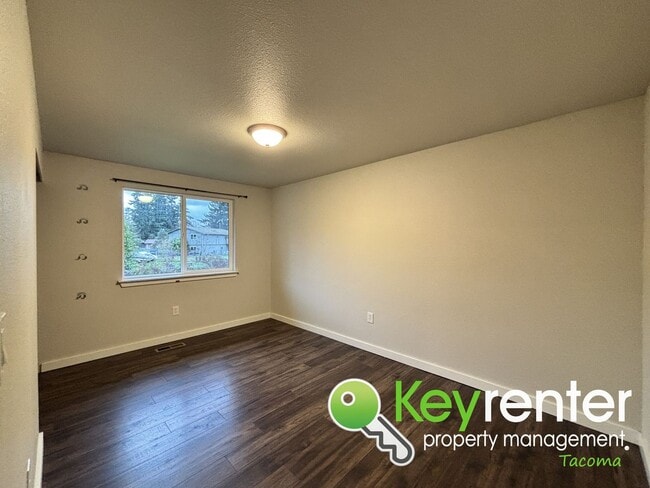 Building Photo - Shared Split level 3 Bed 2 Bath Upstairs Unit with Modern Upgrades Close to JBLM!