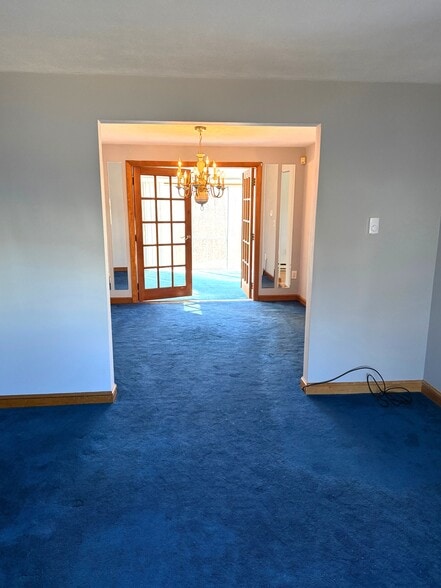 Dining room leading to sunroom - 87 Auburn St