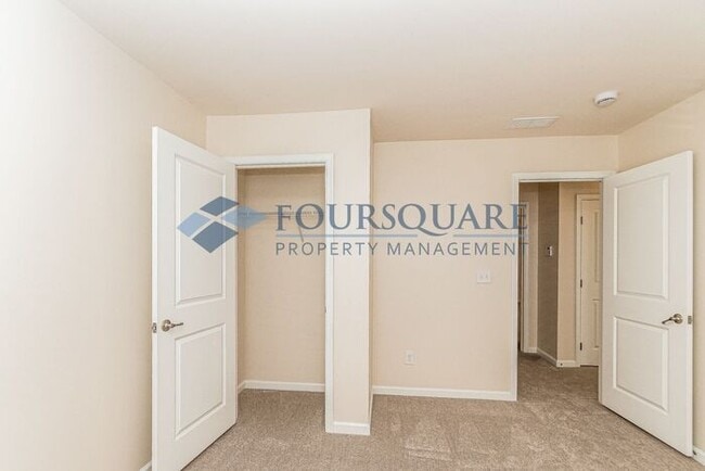 Building Photo - Spacious 3-Bed End Unit Townhome with 2-Car Garage & Private Patio | Prime Kitts Creek Location
