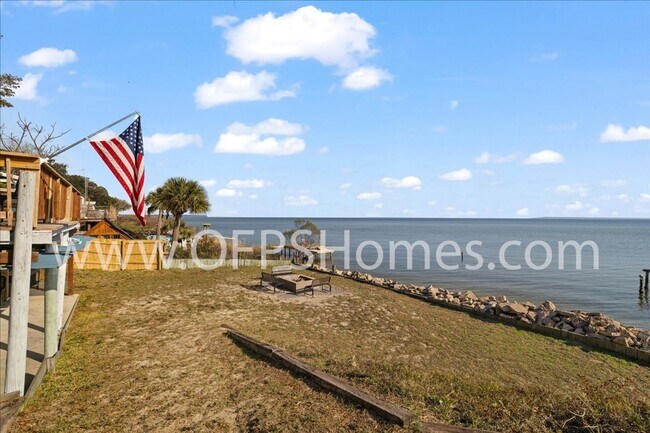 Building Photo - Stunning 4-Bedroom, 3-Bath Waterfront Home in Choctaw Beach – 140ft of Bayfront Bliss!