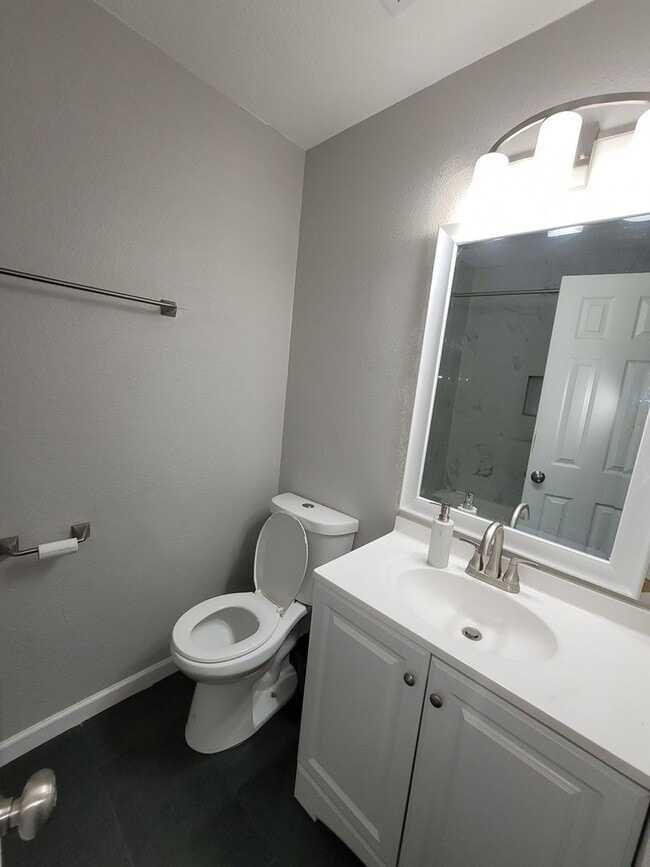 Building Photo - DOVE SPRINGS DELIGHT - RENOVATED  2/2 DUPL...