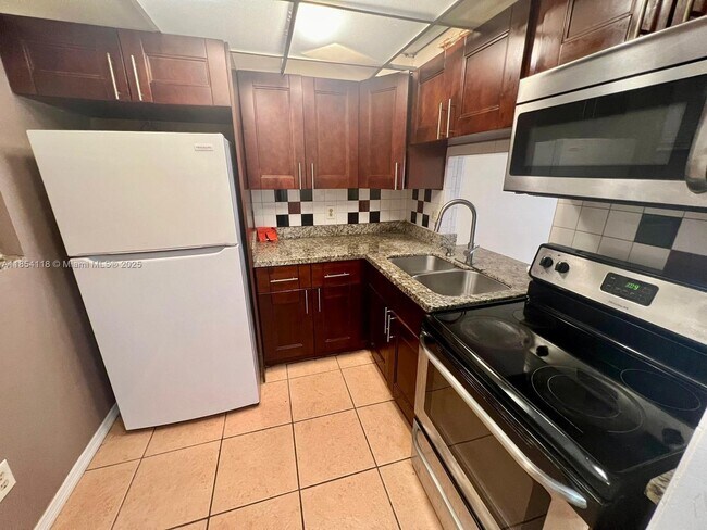 Building Photo - 2800 NW 56th Ave