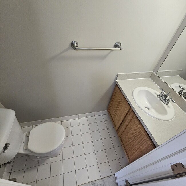 Building Photo - 2 Bedroom, 1.5 Bath Townhouse w/ Garage & Huge Master Bedroom. Full Sized Washer & Dryer In Unit.