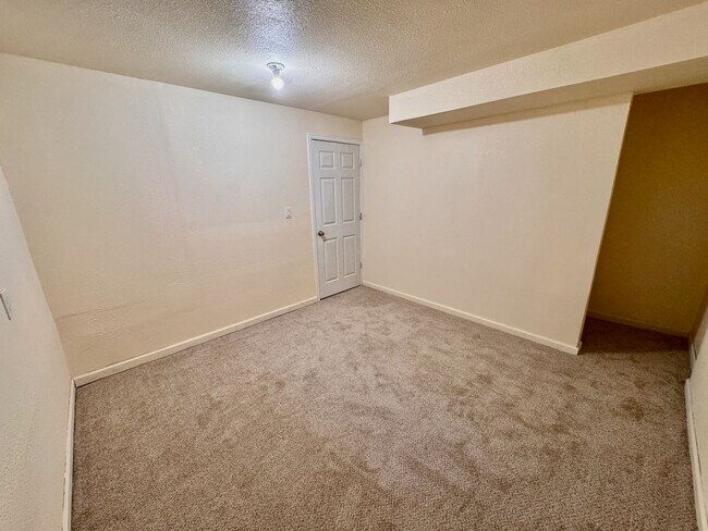 Building Photo - Move-In Ready 4BR Home with Finished Basement, Flex Space & Large Yard