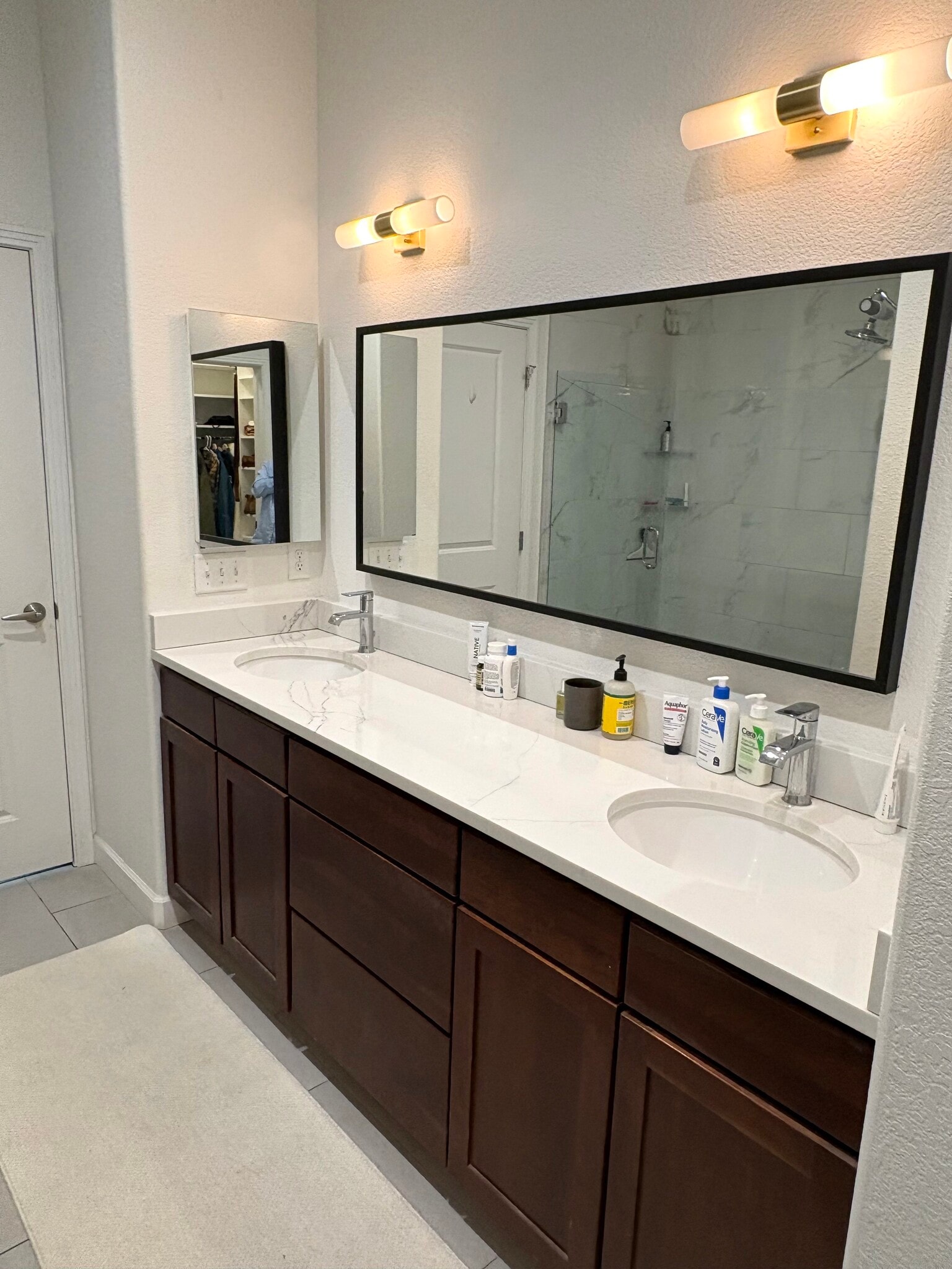 Modern double vanity in primary bath - 200 Poplar St
