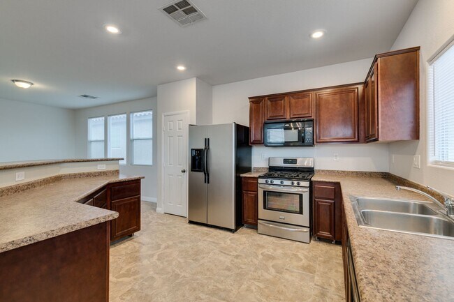 Building Photo - Beautiful Split-Level Home on Corner Lot with Pool and Spa!