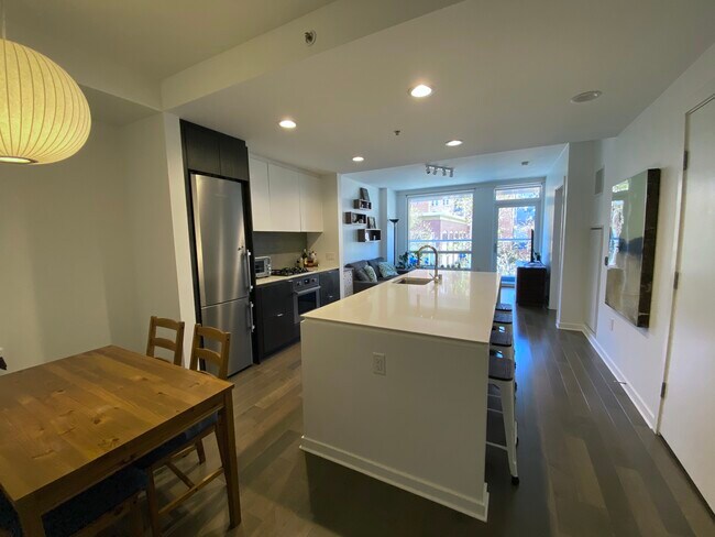 Open floor plan with dining, kitchen and living room - 1788 Clay St