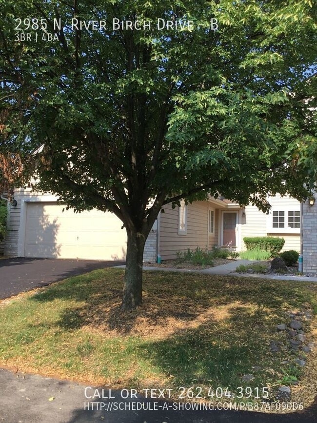 Building Photo - Huge condo with 2 car garage!