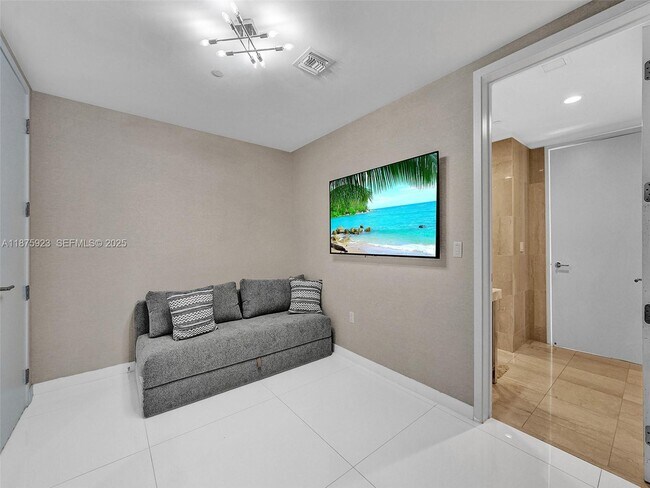 Building Photo - 17475 Collins Ave