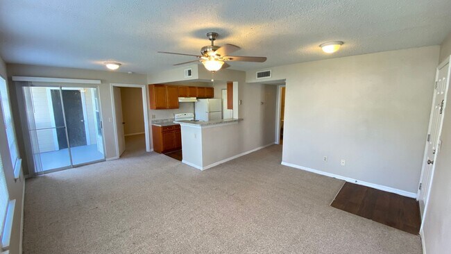 Building Photo - MOVE IN SPECIAL! First Floor 2BR/2BA Condo...